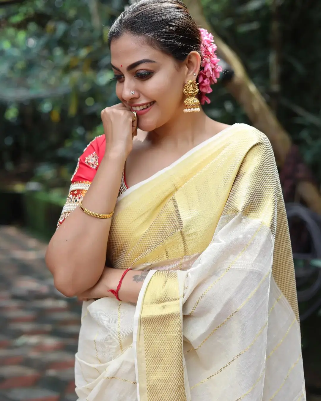 Indian Actress Anusree Nair in White Color Saree Red Blouse